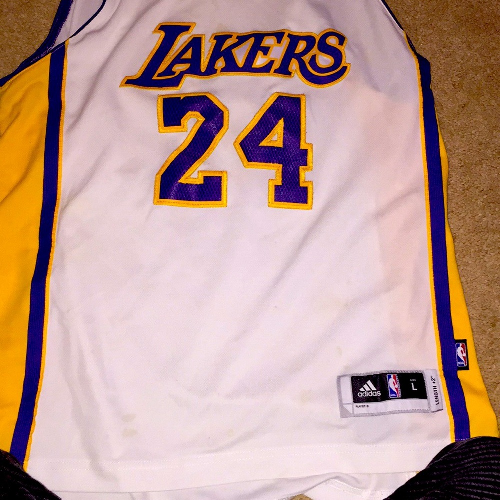 Kobe Bryant 24. Size large. Purple and yellow.